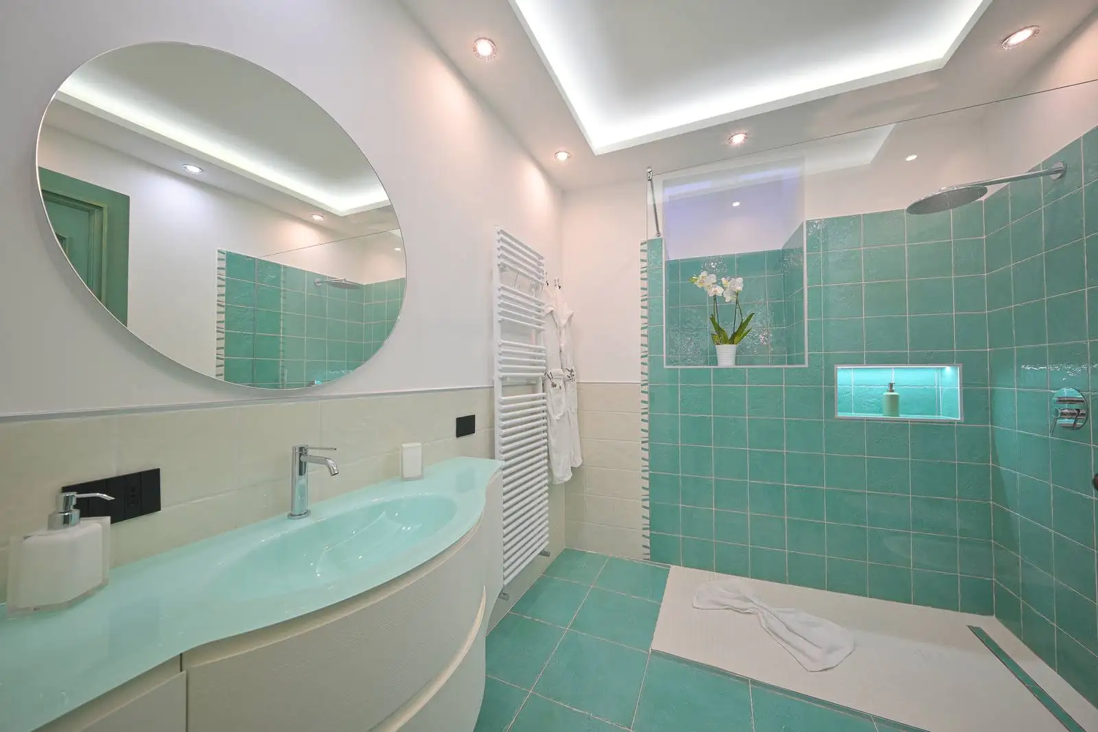 The aqua-green bathroom